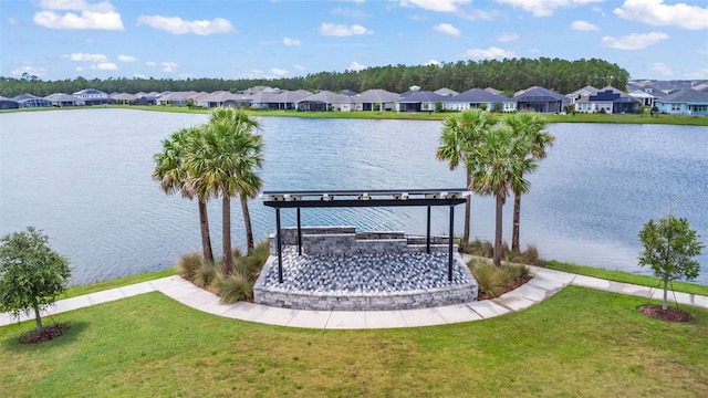180 Azure Mist Way, Daytona Beach, FL 32124 - dock featuring a residential view, a lawn, and a water view