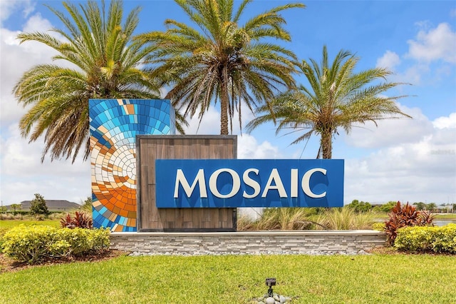 180 Azure Mist Way, Daytona Beach, FL 32124 - community sign with a lawn