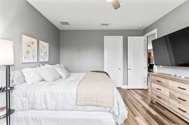 180 Azure Mist Way, Daytona Beach, FL 32124 - bedroom with wood finished floors and a ceiling fan