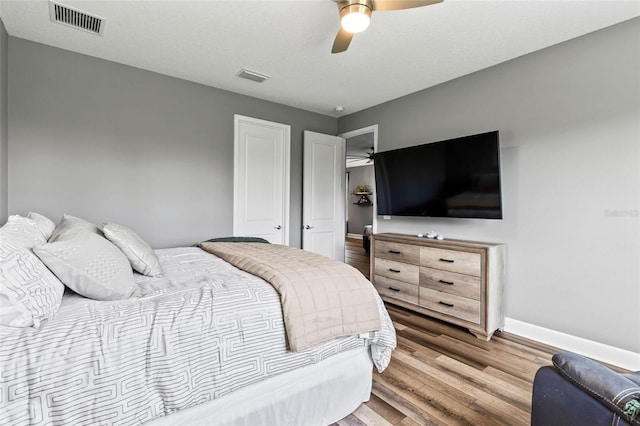 180 Azure Mist Way, Daytona Beach, FL 32124 - bedroom with wood finished floors and a ceiling fan