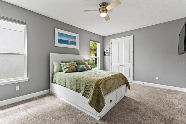 180 Azure Mist Way, Daytona Beach, FL 32124 - carpeted bedroom featuring a closet and ceiling fan