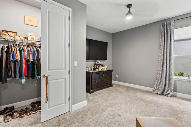 180 Azure Mist Way, Daytona Beach, FL 32124 - carpeted bedroom featuring a closet and a spacious closet
