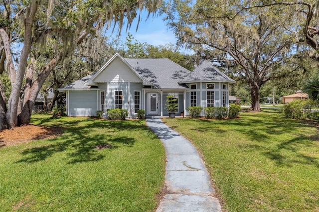 5722 Antler Trl, Lakeland, FL 33811 - view of front of property featuring a front lawn and roof with shingles