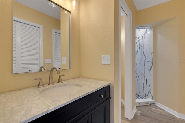 5722 Antler Trl, Lakeland, FL 33811 - full bath with vanity, a stall shower, and wood finished floors