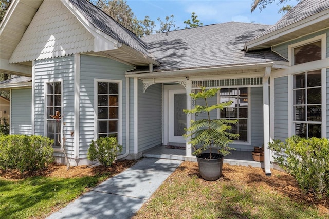 5722 Antler Trl, Lakeland, FL 33811 - doorway to property featuring roof with shingles