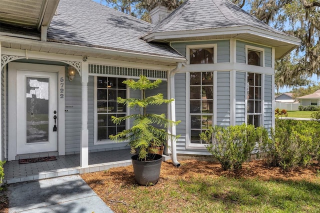 5722 Antler Trl, Lakeland, FL 33811 - entrance to property with a shingled roof