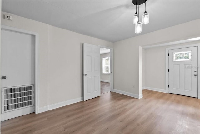 405 S 7th Ave, Bartow, FL 33830 - foyer featuring wood finished floors and healthy amount of natural light