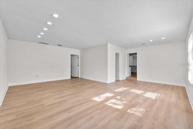 405 S 7th Ave, Bartow, FL 33830 - spare room featuring light wood finished floors and recessed lighting
