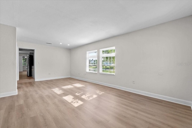 405 S 7th Ave, Bartow, FL 33830 - spare room with light wood-type flooring and recessed lighting