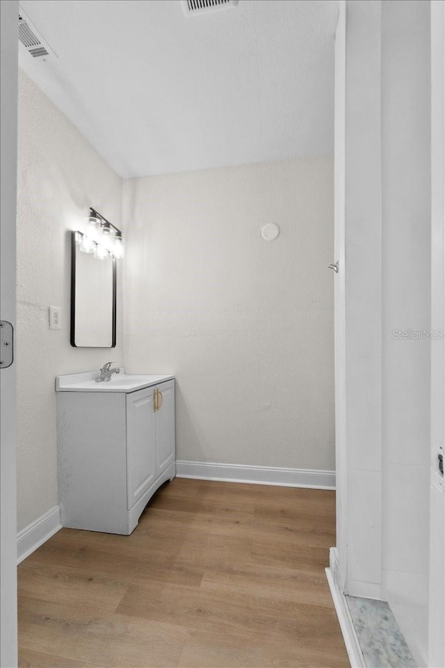 405 S 7th Ave, Bartow, FL 33830 - bathroom with vanity and wood finished floors