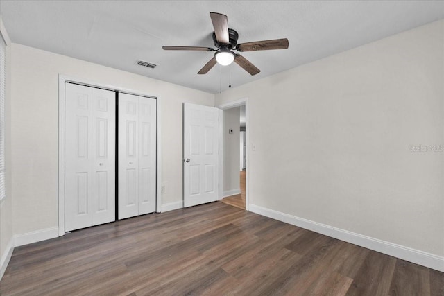 405 S 7th Ave, Bartow, FL 33830 - unfurnished bedroom with wood finished floors, a closet, and ceiling fan
