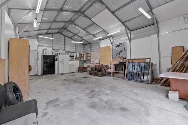 405 S 7th Ave, Bartow, FL 33830 - garage with white refrigerator with ice dispenser