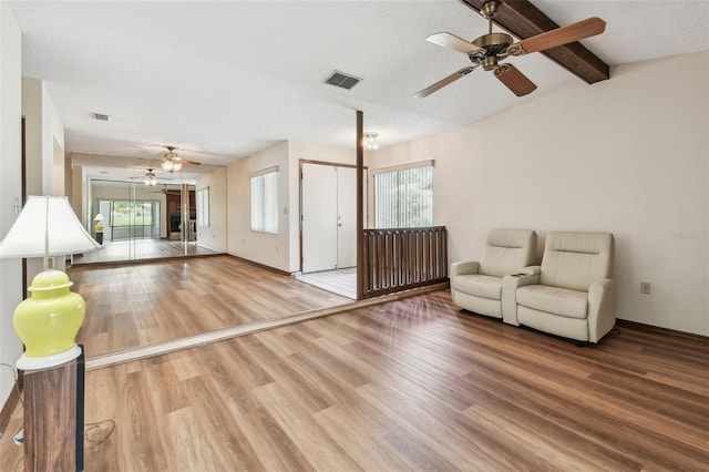 849 Rockingham Rd, Lakeland, FL 33809 - living area with ceiling fan, wood finished floors, and beam ceiling