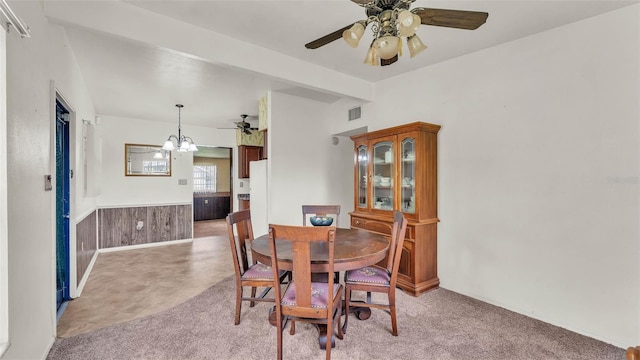 640 Forrest Dr, Bartow, FL 33830 - dining space featuring a chandelier, a ceiling fan, and wainscoting