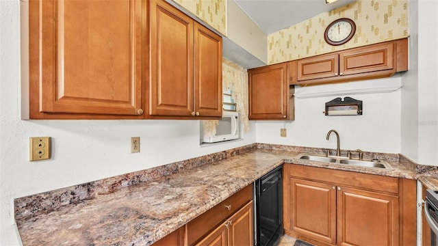 640 Forrest Dr, Bartow, FL 33830 - kitchen with black dishwasher, white microwave, brown cabinetry, and wallpapered walls