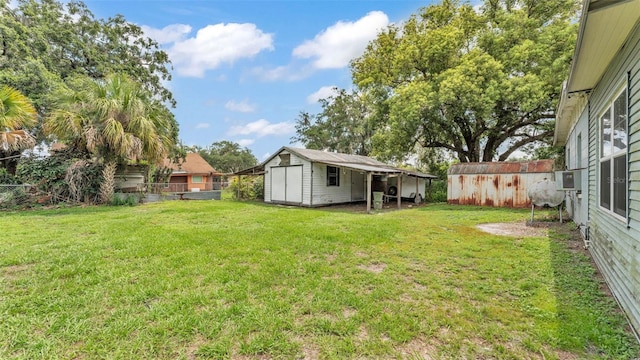 640 Forrest Dr, Bartow, FL 33830 - fenced backyard with a storage unit