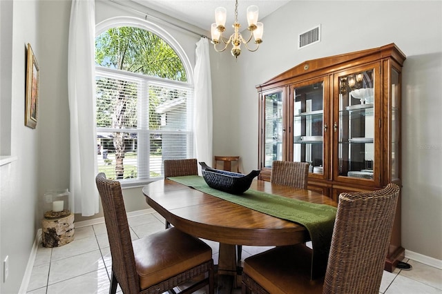 6410 Beechnut Dr, Lakeland, FL 33813 - dining space featuring a chandelier and light tile patterned floors