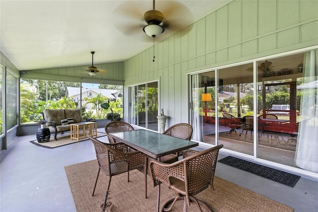 6410 Beechnut Dr, Lakeland, FL 33813 - sunroom / solarium featuring a ceiling fan, vaulted ceiling, outdoor dining area, and an outdoor living space
