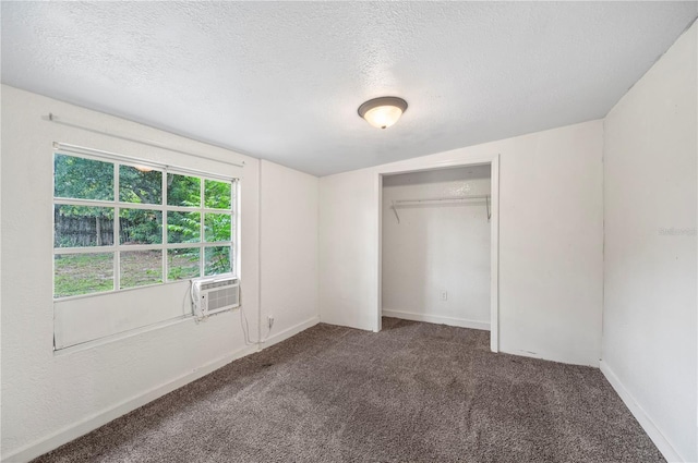 1133 Bryn Mawr Ave, Lake Wales, FL 33853 - unfurnished bedroom featuring carpet floors, a textured ceiling, and a closet