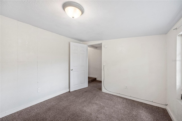 1133 Bryn Mawr Ave, Lake Wales, FL 33853 - carpeted empty room with baseboards