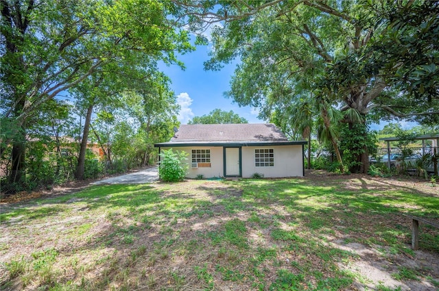 1133 Bryn Mawr Ave, Lake Wales, FL 33853 - back of property featuring a lawn