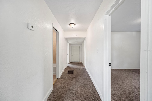1133 Bryn Mawr Ave, Lake Wales, FL 33853 - hallway featuring carpet flooring and baseboards