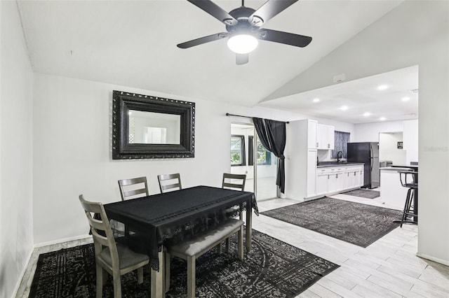 3854 Feather Dr, Lakeland, FL 33812 - dining space with lofted ceiling, a ceiling fan, and wood finish floors