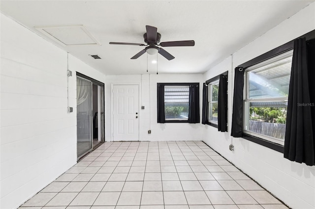 3854 Feather Dr, Lakeland, FL 33812 - spare room with ceiling fan, healthy amount of natural light, and light tile patterned floors