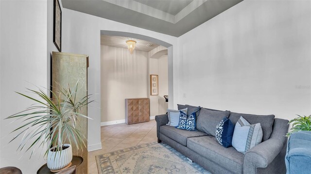 11825 Frost Aster Dr, Riverview, FL 33579 - living area featuring arched walkways and light tile patterned flooring