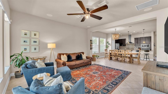 11825 Frost Aster Dr, Riverview, FL 33579 - living area featuring light tile patterned flooring and a ceiling fan