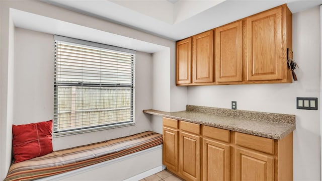 6406 Butternut Dr, Lakeland, FL 33813 - kitchen featuring plenty of natural light and light tile patterned floors