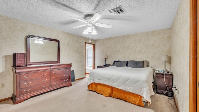 6406 Butternut Dr, Lakeland, FL 33813 - bedroom with light colored carpet, ceiling fan, and a textured ceiling