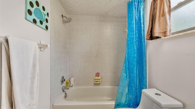 6406 Butternut Dr, Lakeland, FL 33813 - full bath with shower / tub combo with curtain and toilet
