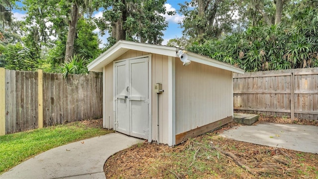 6406 Butternut Dr, Lakeland, FL 33813 - view of shed with a fenced backyard