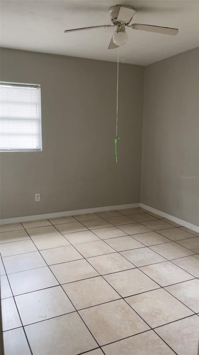 2708 Dixie Rd, Lakeland, FL 33801 - unfurnished room with ceiling fan and light tile patterned floors