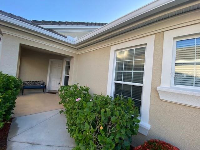 1707 Laurel Glen Pl, Lakeland, FL 33803 - property entrance featuring stucco siding