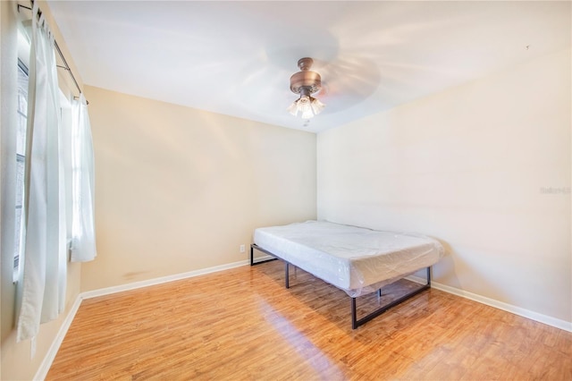 1523 Mariner Rd, Lakeland, FL 33803 - bedroom featuring light wood-type flooring and ceiling fan