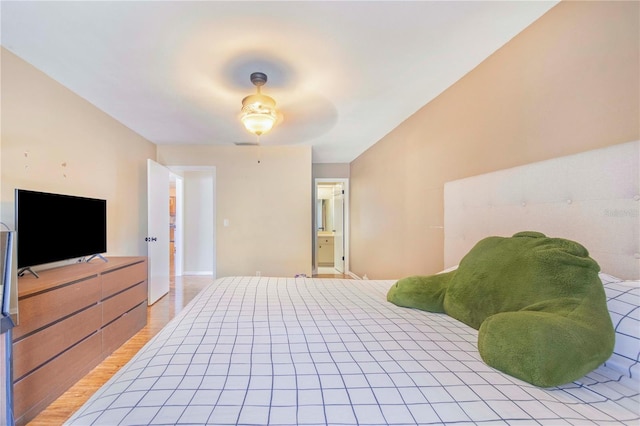 1523 Mariner Rd, Lakeland, FL 33803 - bedroom with light wood-style flooring and baseboards