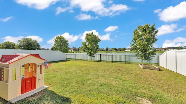 3739 Peregrine Way, Lakeland, FL 33811 - fenced backyard with a water view