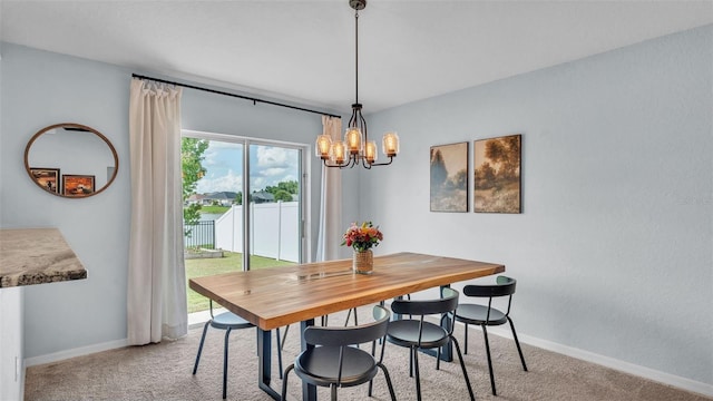 3739 Peregrine Way, Lakeland, FL 33811 - dining room with carpet flooring and a chandelier