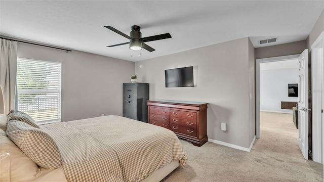 3739 Peregrine Way, Lakeland, FL 33811 - bedroom featuring light carpet and ceiling fan