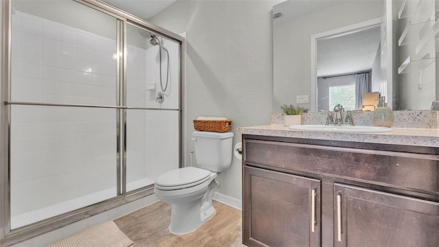3739 Peregrine Way, Lakeland, FL 33811 - full bath with vanity, a stall shower, and wood finished floors