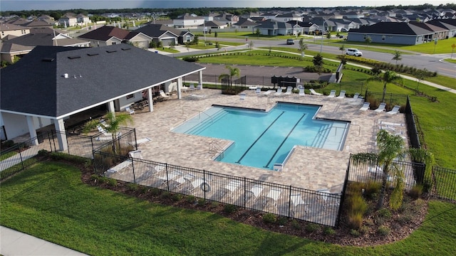 3739 Peregrine Way, Lakeland, FL 33811 - community pool with a patio area and a residential view