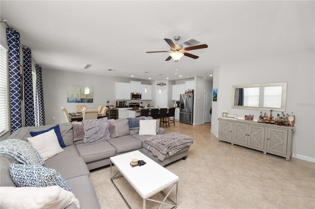1044 Oliveto Verdi Ct, Brandon, FL 33511 - living area featuring ceiling fan, light tile patterned floors, and recessed lighting