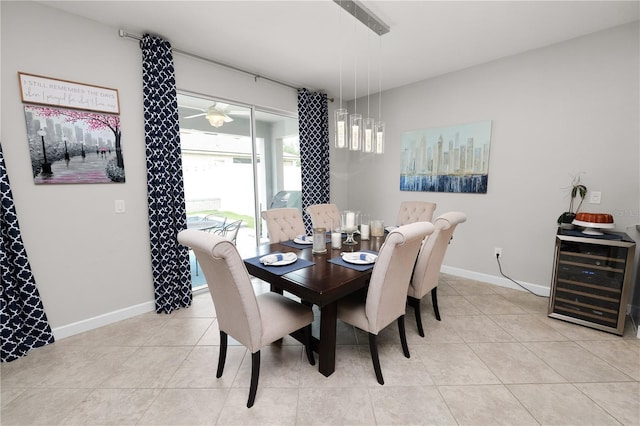 1044 Oliveto Verdi Ct, Brandon, FL 33511 - dining room with beverage cooler and light tile patterned floors