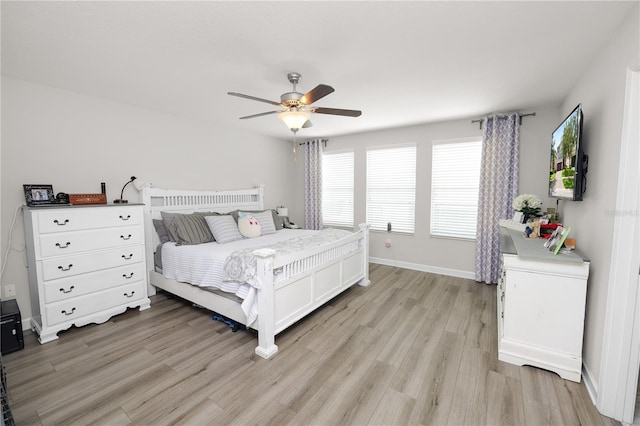 1044 Oliveto Verdi Ct, Brandon, FL 33511 - bedroom featuring light wood finished floors and ceiling fan