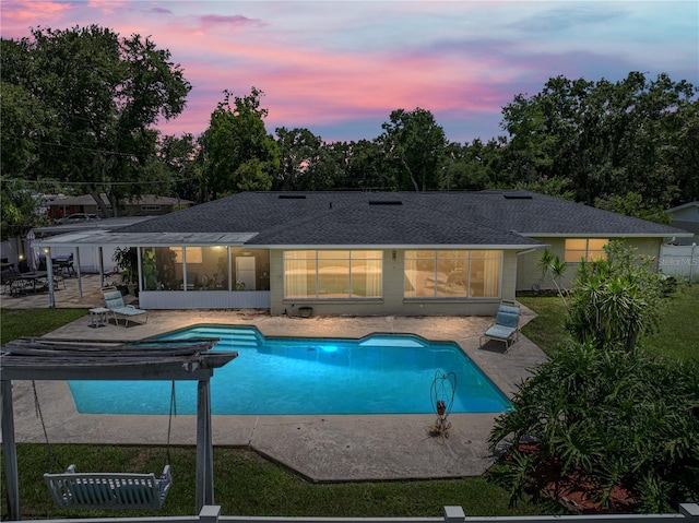 1232 Fairlee St, Lakeland, FL 33813 - outdoor pool featuring a sunroom and a patio area