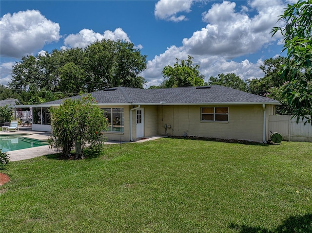 1232 Fairlee St, Lakeland, FL 33813 - back of property with roof with shingles and a patio area
