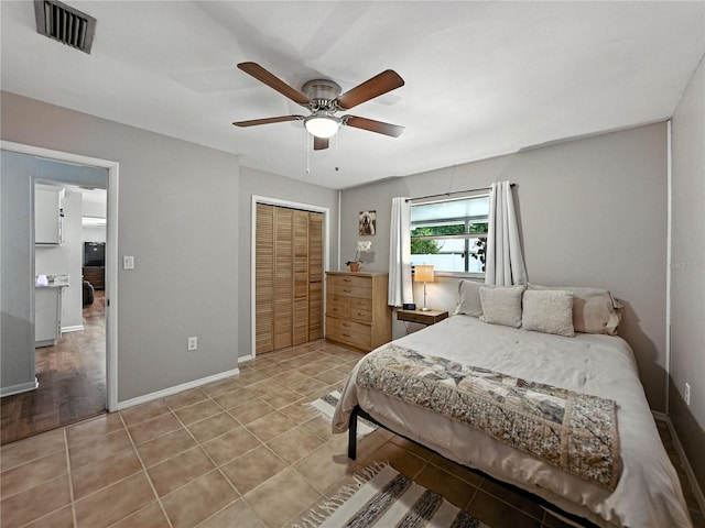 1232 Fairlee St, Lakeland, FL 33813 - bedroom featuring a closet, ceiling fan, and light tile patterned floors