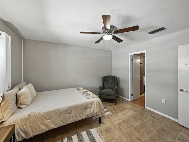 1232 Fairlee St, Lakeland, FL 33813 - tiled bedroom featuring baseboards and a ceiling fan